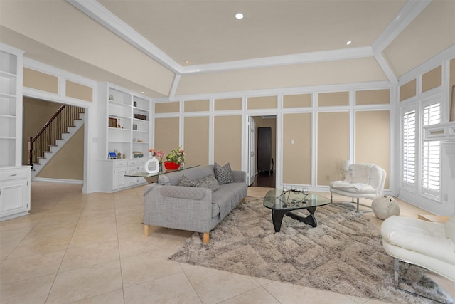 9311 Windrush Dr, Spring, TX 77379 - living room featuring built in shelves, crown molding, stairway, light tile patterned floors, and recessed lighting