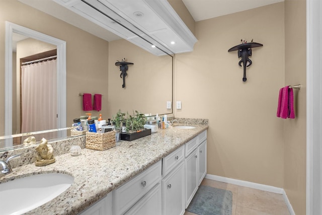 9311 Windrush Dr, Spring, TX 77379 - bathroom with double vanity and tile patterned floors