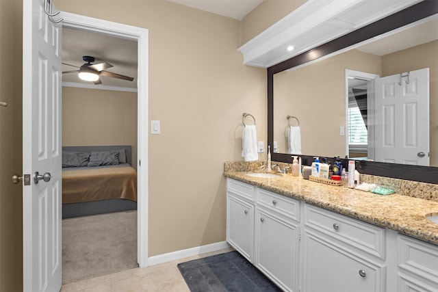 9311 Windrush Dr, Spring, TX 77379 - ensuite bathroom featuring double vanity, ceiling fan, tile patterned flooring, and ornamental molding