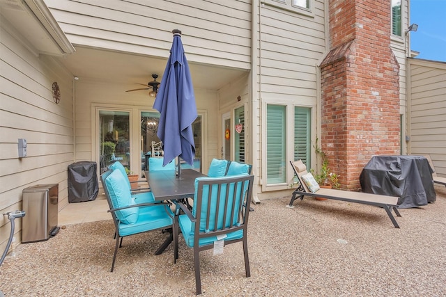 9311 Windrush Dr, Spring, TX 77379 - view of patio / terrace featuring area for grilling, a ceiling fan, and outdoor dining space