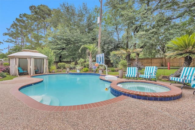 9311 Windrush Dr, Spring, TX 77379 - view of swimming pool featuring a gazebo and a pool with connected hot tub