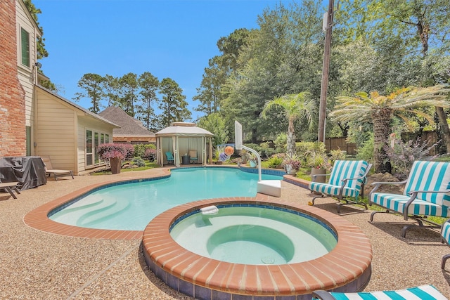 9311 Windrush Dr, Spring, TX 77379 - view of pool featuring a grill and a pool with connected hot tub