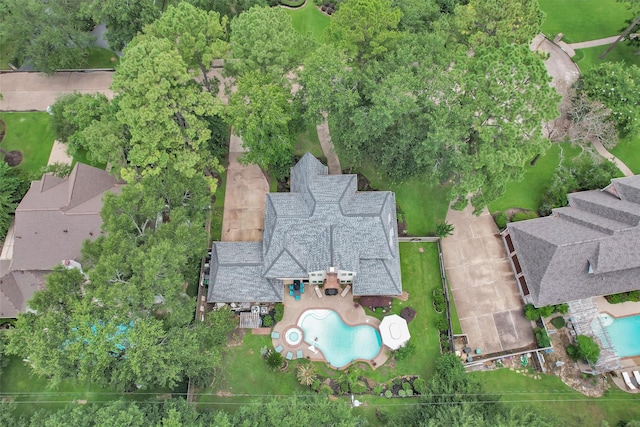 9311 Windrush Dr, Spring, TX 77379 - aerial view of property and surrounding area with a pool