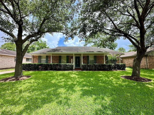 5818 Birchmont Dr, Houston, TX 77092 - single story home featuring a front yard and brick siding
