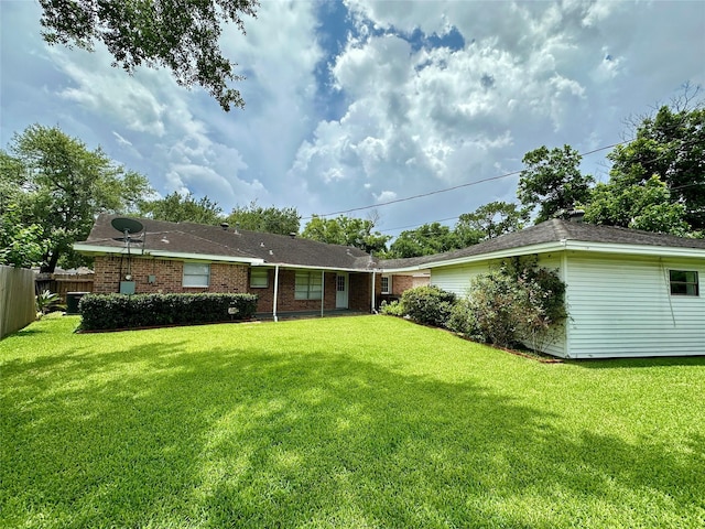 5818 Birchmont Dr, Houston, TX 77092 - back of house featuring brick siding