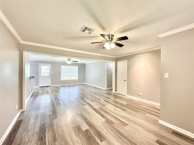 5818 Birchmont Dr, Houston, TX 77092 - spare room with a ceiling fan, a textured ceiling, wood finished floors, and crown molding
