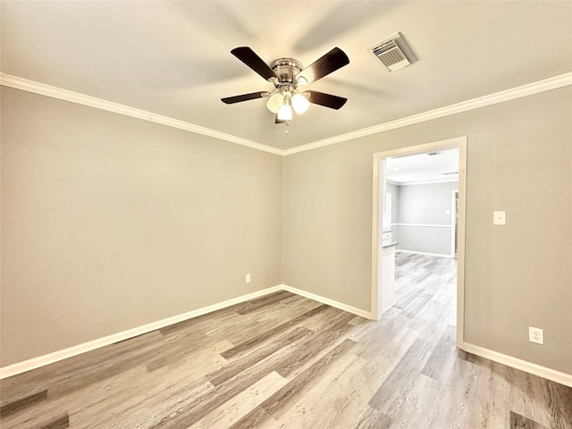 5818 Birchmont Dr, Houston, TX 77092 - empty room featuring wood finished floors, a ceiling fan, and crown molding