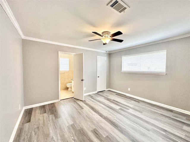 5818 Birchmont Dr, Houston, TX 77092 - unfurnished bedroom with crown molding, wood finished floors, multiple windows, ensuite bathroom, and ceiling fan