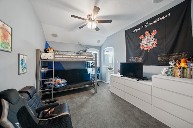 14014 Lakewood Crossing Blvd, Houston, TX 77070 - carpeted bedroom with lofted ceiling, arched walkways, and ceiling fan