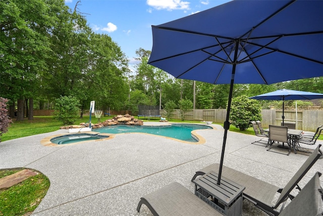 14014 Lakewood Crossing Blvd, Houston, TX 77070 - view of pool with a patio area, a fenced backyard, and an in-ground hot tub