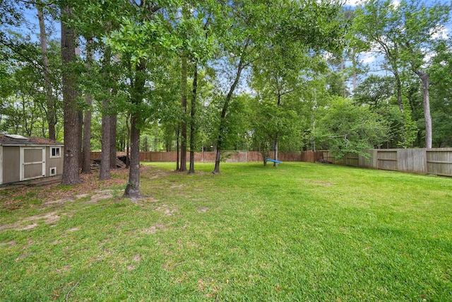 14014 Lakewood Crossing Blvd, Houston, TX 77070 - view of yard with a shed and view of wooded area