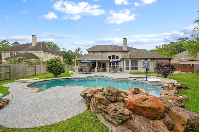 14014 Lakewood Crossing Blvd, Houston, TX 77070 - view of swimming pool featuring a patio, a fenced backyard, and outdoor dining space