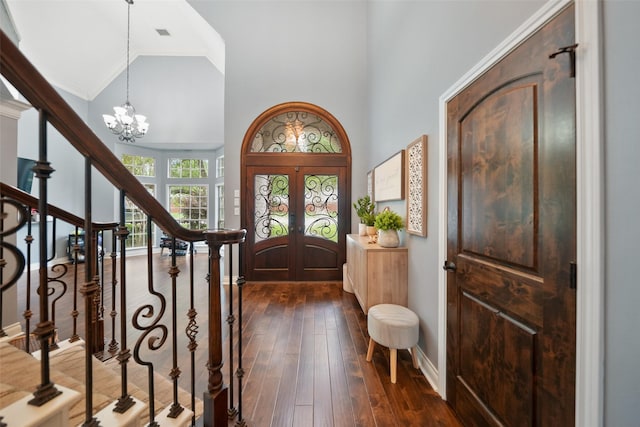 14014 Lakewood Crossing Blvd, Houston, TX 77070 - entrance foyer featuring a chandelier, dark wood-style floors, french doors, stairway, and high vaulted ceiling