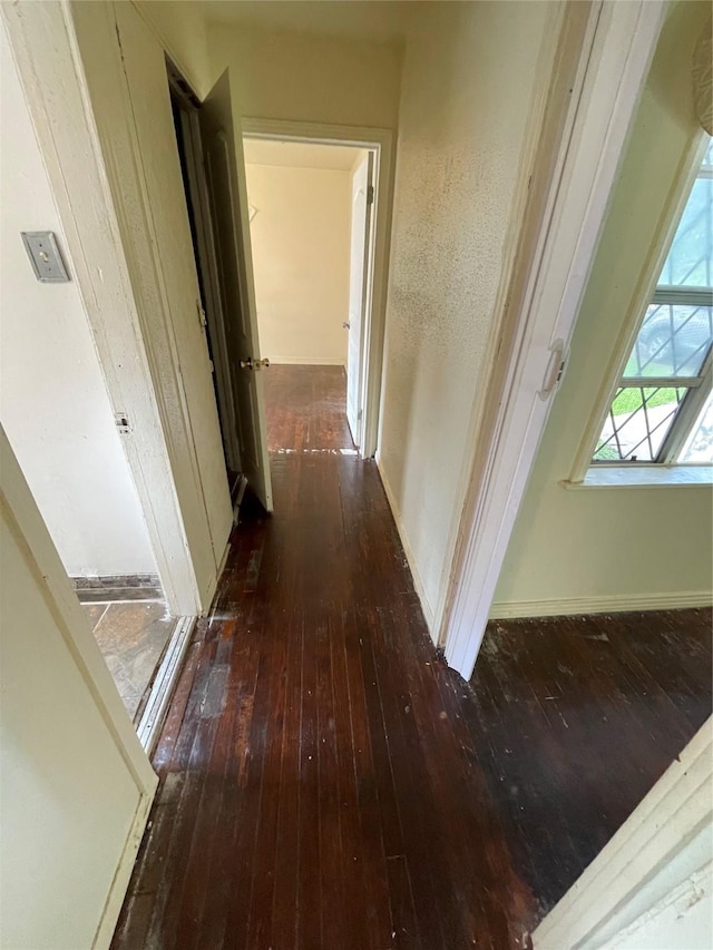 7539 Carothers St, Houston, TX 77028 - hall with wood-type flooring and baseboards