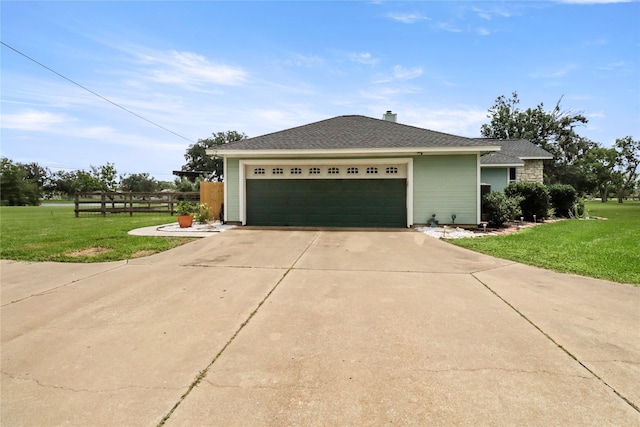105 Sally Lake Ct, Angleton, TX 77515 - view of front facade with concrete driveway, an attached garage, and roof with shingles