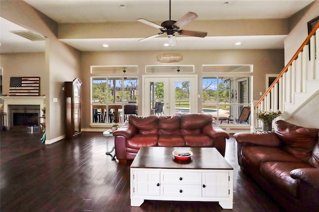 105 Sally Lake Ct, Angleton, TX 77515 - living room featuring recessed lighting, a ceiling fan, dark wood finished floors, french doors, and a fireplace