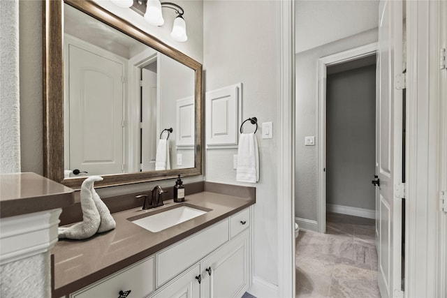 1002 Pleasant Pines Ln, Pinehurst, TX 77362 - bathroom featuring vanity and marble look tile flooring