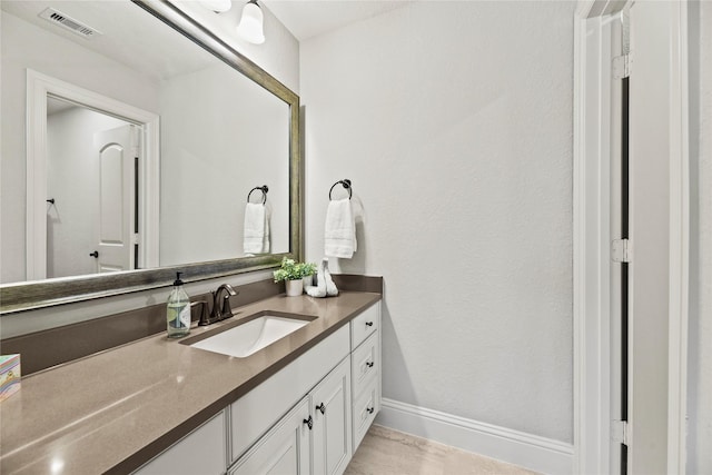 1002 Pleasant Pines Ln, Pinehurst, TX 77362 - bathroom with vanity and wood finished floors