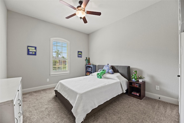 1002 Pleasant Pines Ln, Pinehurst, TX 77362 - bedroom featuring light colored carpet and a ceiling fan