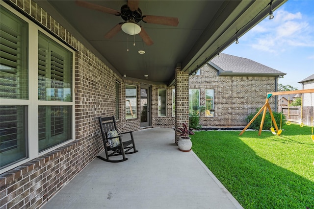 1002 Pleasant Pines Ln, Pinehurst, TX 77362 - view of patio / terrace with a playground and ceiling fan