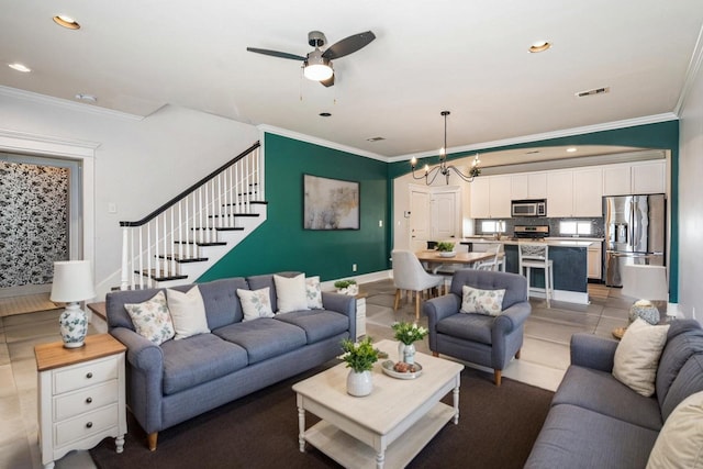 2919 Gillespie St, Houston, TX 77020 - living room with crown molding, a ceiling fan, recessed lighting, and a chandelier