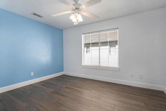 2919 Gillespie St, Houston, TX 77020 - empty room featuring dark wood finished floors and a ceiling fan