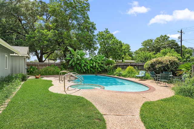 1908 Milam St, Columbus, TX 78934 - view of pool with a patio, a fenced backyard, and a pool with connected hot tub