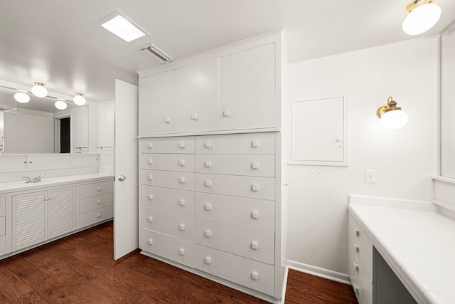 1908 Milam St, Columbus, TX 78934 - bathroom with vanity and wood finished floors