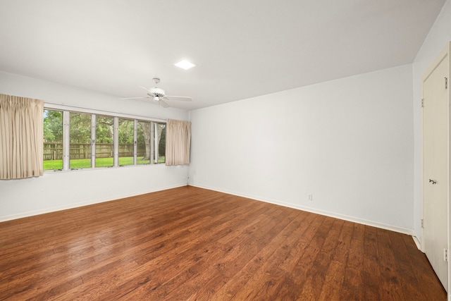 1908 Milam St, Columbus, TX 78934 - spare room with ceiling fan and hardwood / wood-style flooring