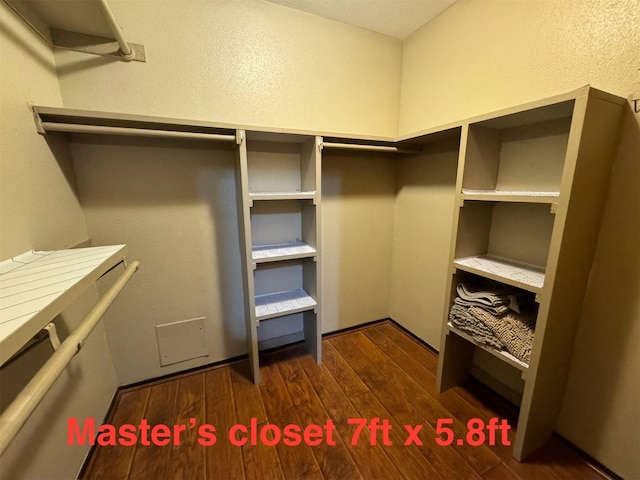 5155 Verdenbruk Dr, Houston, TX 77066 - spacious closet featuring dark wood-type flooring