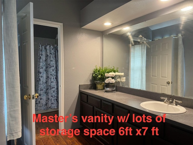 5155 Verdenbruk Dr, Houston, TX 77066 - full bath with vanity and wood finished floors