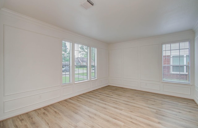 20531 Spring Rose Dr, Katy, TX 77450 - unfurnished room with a decorative wall, ornamental molding, and light wood finished floors