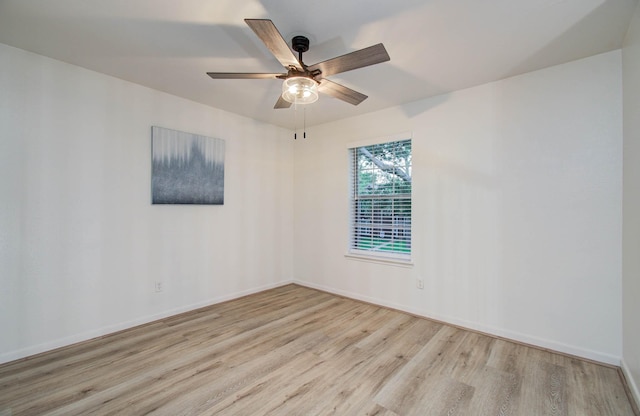 20531 Spring Rose Dr, Katy, TX 77450 - unfurnished room featuring wood finished floors and a ceiling fan