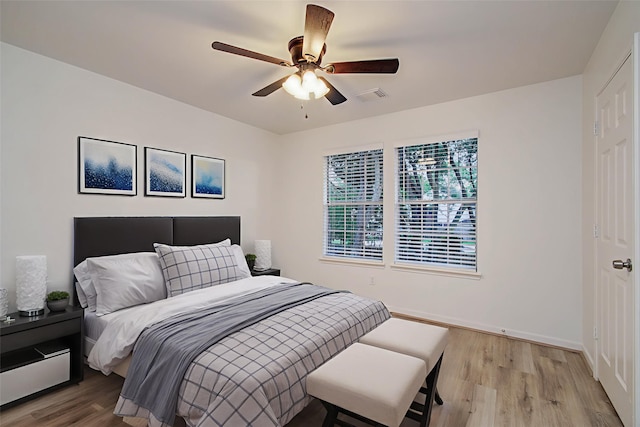 20531 Spring Rose Dr, Katy, TX 77450 - bedroom with wood finished floors and ceiling fan