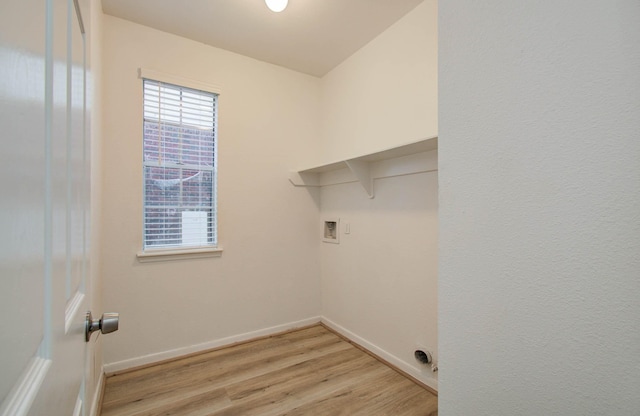20531 Spring Rose Dr, Katy, TX 77450 - washroom featuring light wood-style floors and washer hookup