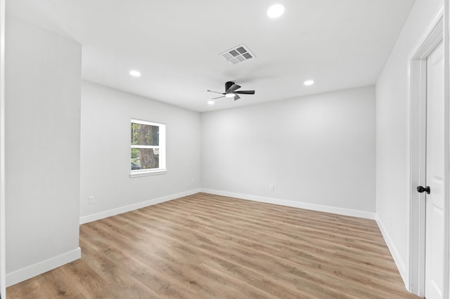 327 E Delz Dr, Houston, TX 77022 - unfurnished room with recessed lighting, light wood-style floors, and ceiling fan