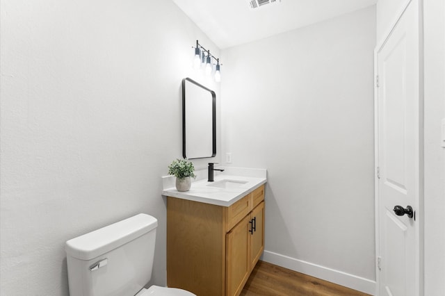 327 E Delz Dr, Houston, TX 77022 - bathroom featuring vanity and wood finished floors