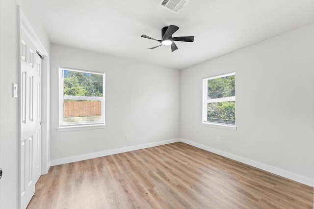 327 E Delz Dr, Houston, TX 77022 - unfurnished bedroom with light wood finished floors, a closet, and a ceiling fan