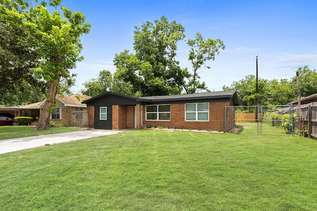 327 E Delz Dr, Houston, TX 77022 - single story home with concrete driveway and brick siding