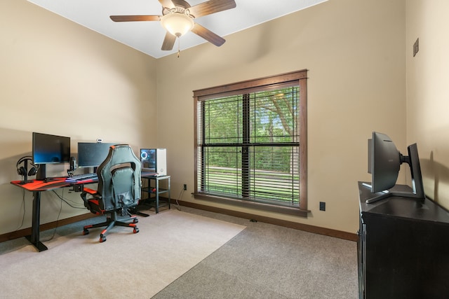 15608 Queen Victoria Ct, Montgomery, TX 77316 - carpeted home office with baseboards and a ceiling fan