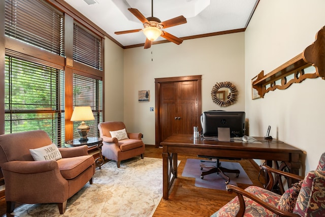 15608 Queen Victoria Ct, Montgomery, TX 77316 - office space featuring wood finished floors, ornamental molding, and a ceiling fan