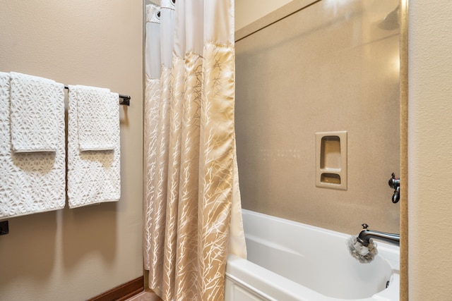 15608 Queen Victoria Ct, Montgomery, TX 77316 - bathroom featuring shower / bath combo with shower curtain