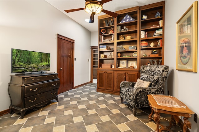 15608 Queen Victoria Ct, Montgomery, TX 77316 - living area featuring a ceiling fan and baseboards