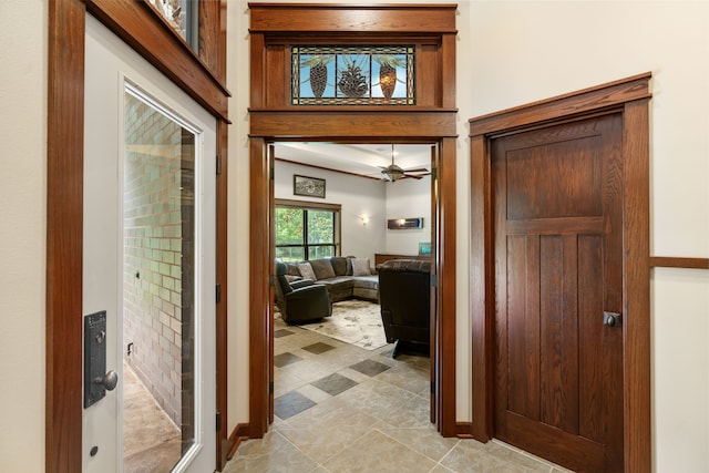 15608 Queen Victoria Ct, Montgomery, TX 77316 - foyer entrance with a ceiling fan and baseboards