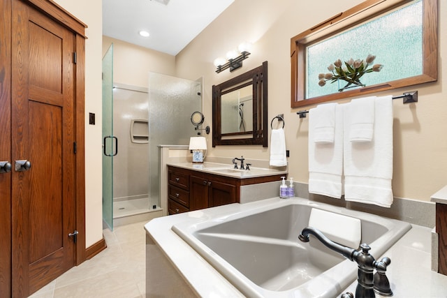 15608 Queen Victoria Ct, Montgomery, TX 77316 - full bathroom with a shower stall, a bath, vanity, and tile patterned floors