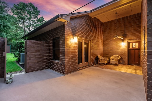 15608 Queen Victoria Ct, Montgomery, TX 77316 - patio terrace at dusk featuring a patio area and a ceiling fan