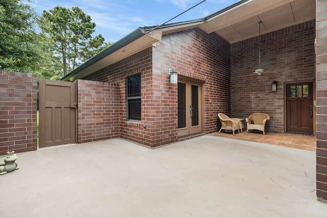15608 Queen Victoria Ct, Montgomery, TX 77316 - view of patio / terrace featuring a gate and french doors