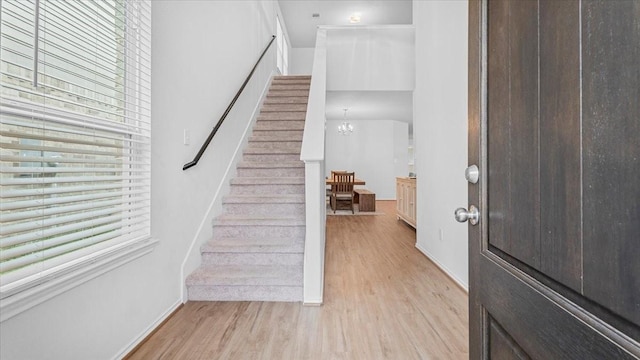 17734 Pensford Way, Tomball, TX 77377 - entrance foyer featuring healthy amount of natural light, light wood finished floors, and stairway