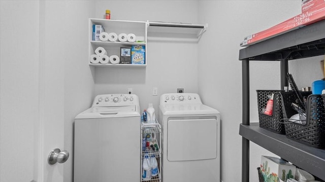 17734 Pensford Way, Tomball, TX 77377 - washroom with washing machine and clothes dryer