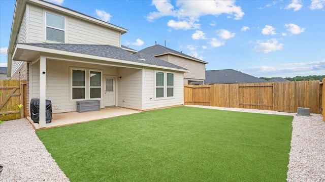 17734 Pensford Way, Tomball, TX 77377 - rear view of house featuring a fenced backyard, a patio area, and a shingled roof